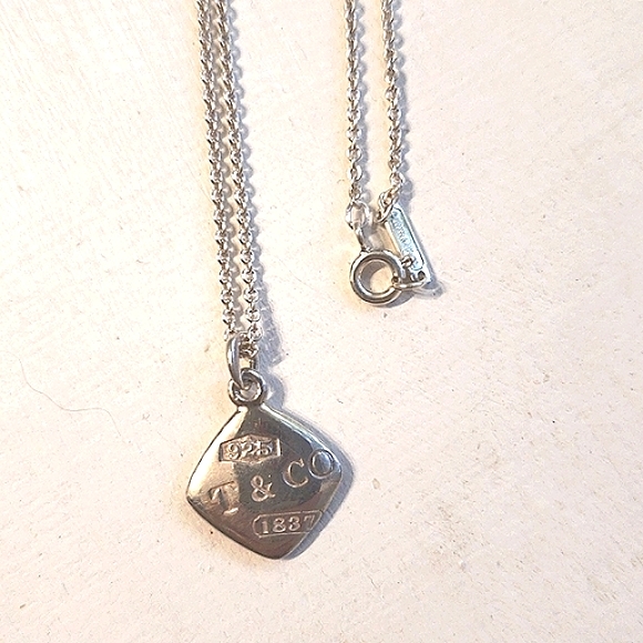 Tiffany & Co. Italian sterling 16" chain with signature diamond-shape charm. - Picture 2 of 7